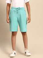 Kids - Boys Shorts Light Teal  Product Type: Shorts Pattern: Solid Color: Light Teal   Fit: Regular Fit  Product Material: Cotton Length: Knee Length  The style has a elastics and draw string closure and includes multi-pocket styling. The Shorts have a deep, solid body and are constructed in hard-wearing cotton fabric that will offer great comfort to your little one