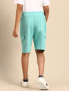 Kids - Boys Shorts Light Teal  Product Type: Shorts Pattern: Solid Color: Light Teal   Fit: Regular Fit  Product Material: Cotton Length: Knee Length  The style has a elastics and draw string closure and includes multi-pocket styling. The Shorts have a deep, solid body and are constructed in hard-wearing cotton fabric that will offer great comfort to your little one