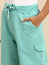Kids - Boys Shorts Light Teal  Product Type: Shorts Pattern: Solid Color: Light Teal   Fit: Regular Fit  Product Material: Cotton Length: Knee Length  The style has a elastics and draw string closure and includes multi-pocket styling. The Shorts have a deep, solid body and are constructed in hard-wearing cotton fabric that will offer great comfort to your little one